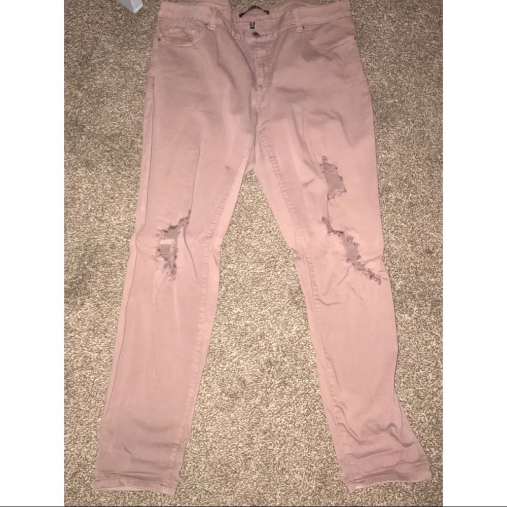 Mauve ripped jeans